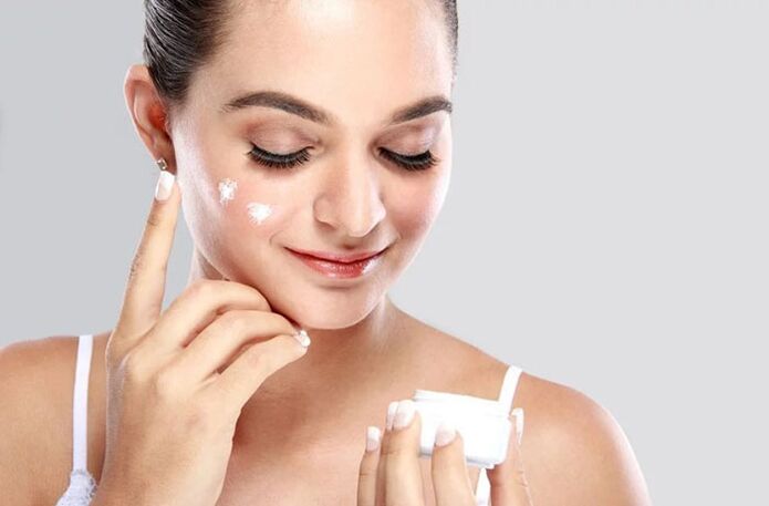 Before using the massager, apply massage cream on your face